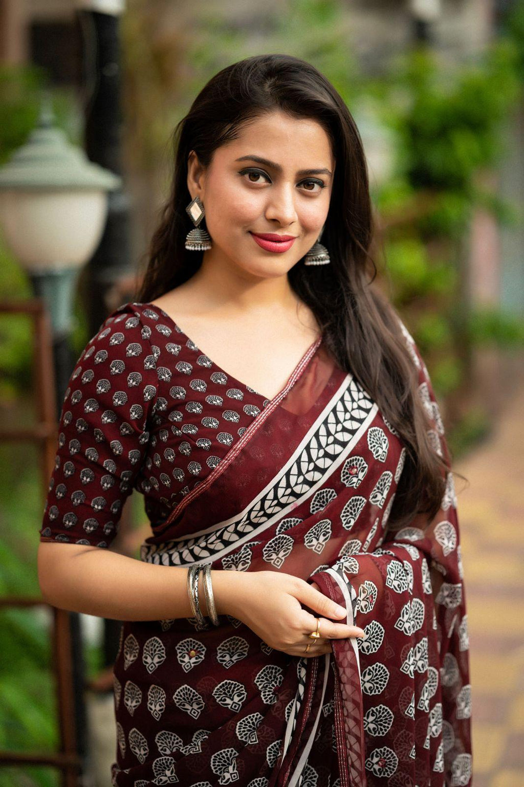 Maroon Poly Georgette Ajrak Saree with Aari Mirror Work