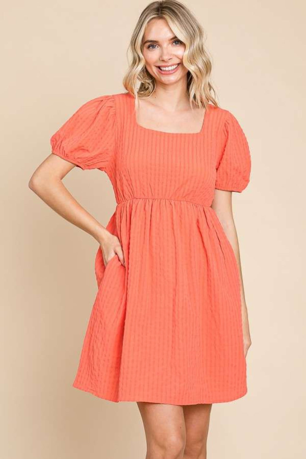 Modern square neck dress with textured fabric and short sleeves