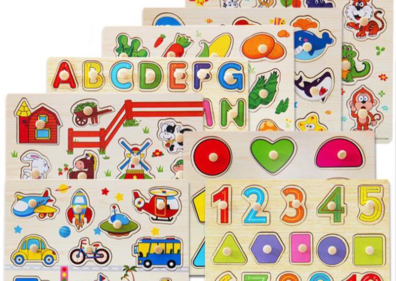 Multicolor wooden educational puzzle board with animal and vegetable shapes on a light wood base.