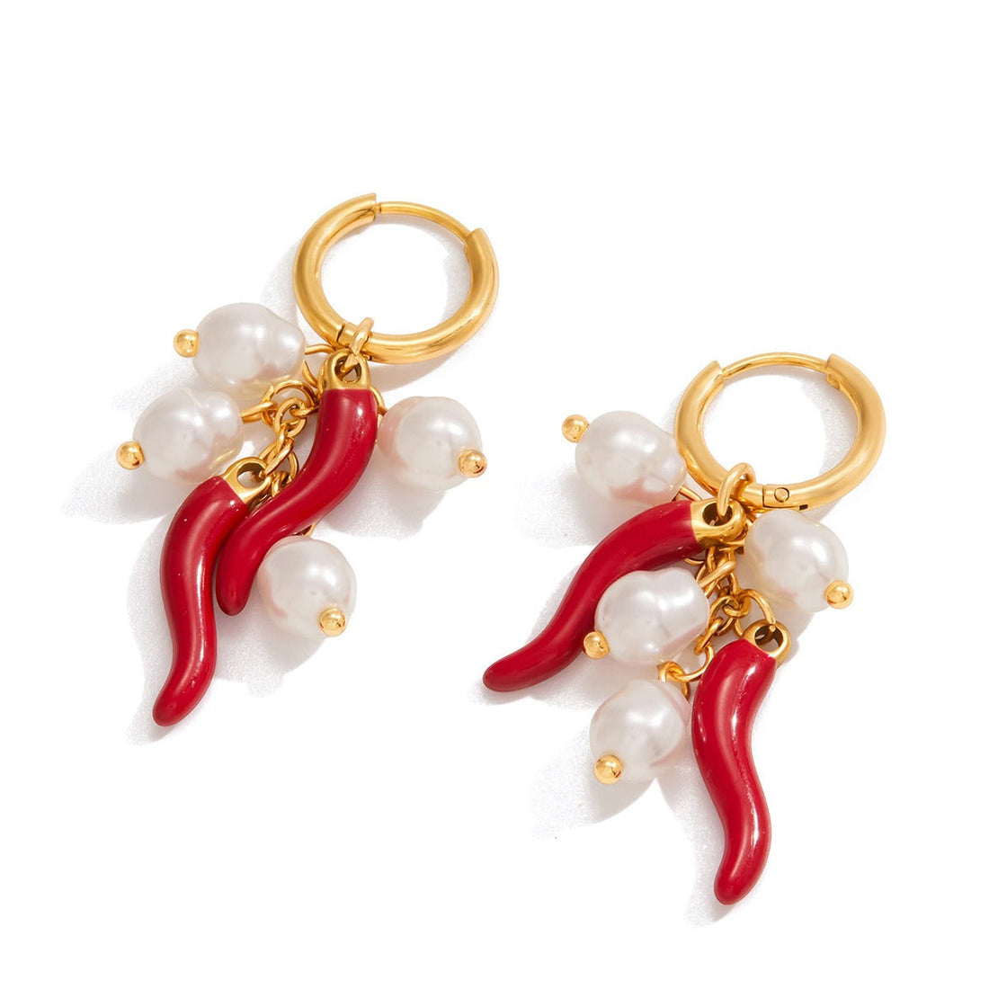 A pair of 18K gold chili pepper shaped earrings with a lustrous pearl accent.