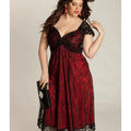 A woman wearing a Gothic-style lace midi dress with a V-neckline, cap sleeves, and a twist-front bodice, available in solid black or black-and-red.