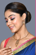 Golden Ruby Green Jadau Kundan pendant set with matching earrings