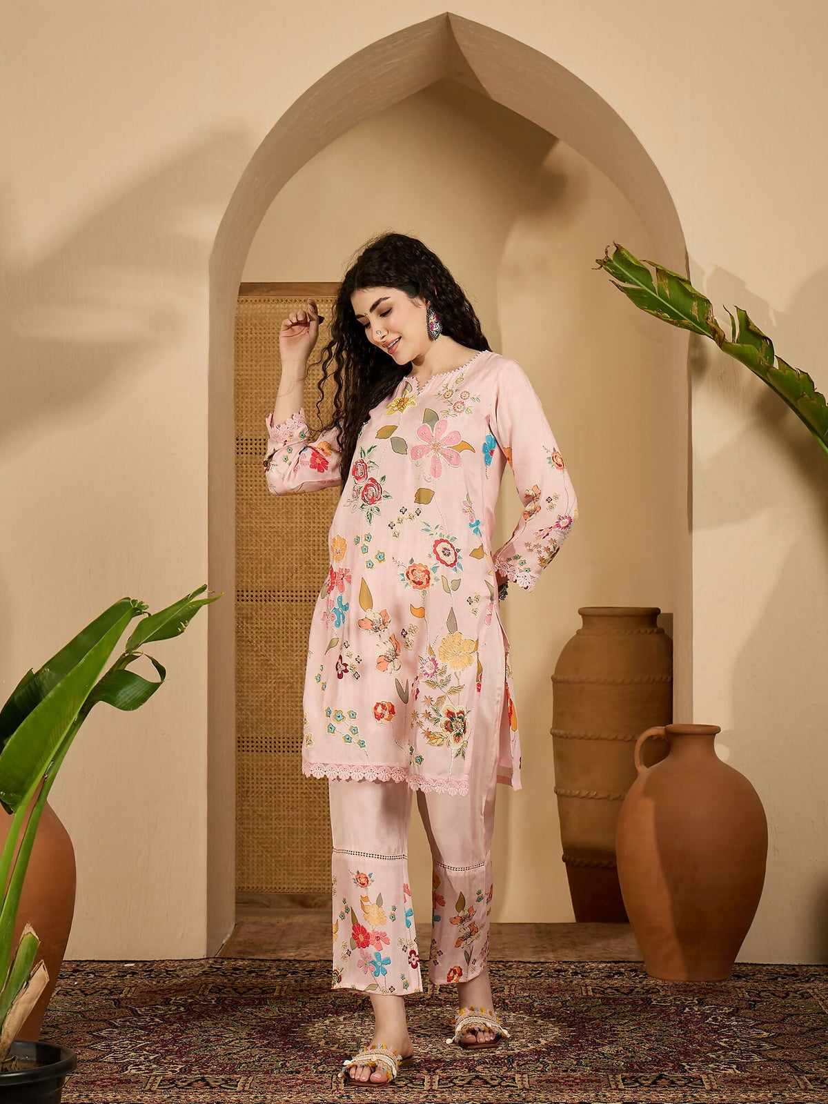 Woman wearing a stylish printed pink pure cotton co-ord set.