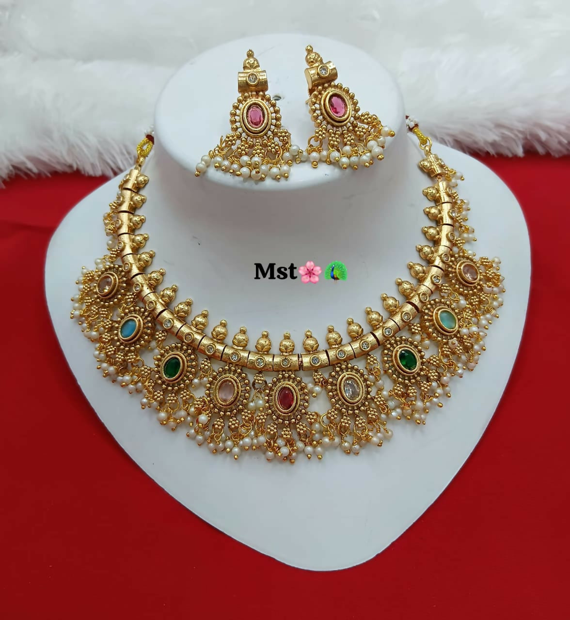 Elegant ruby-toned brass necklace and earring set for women