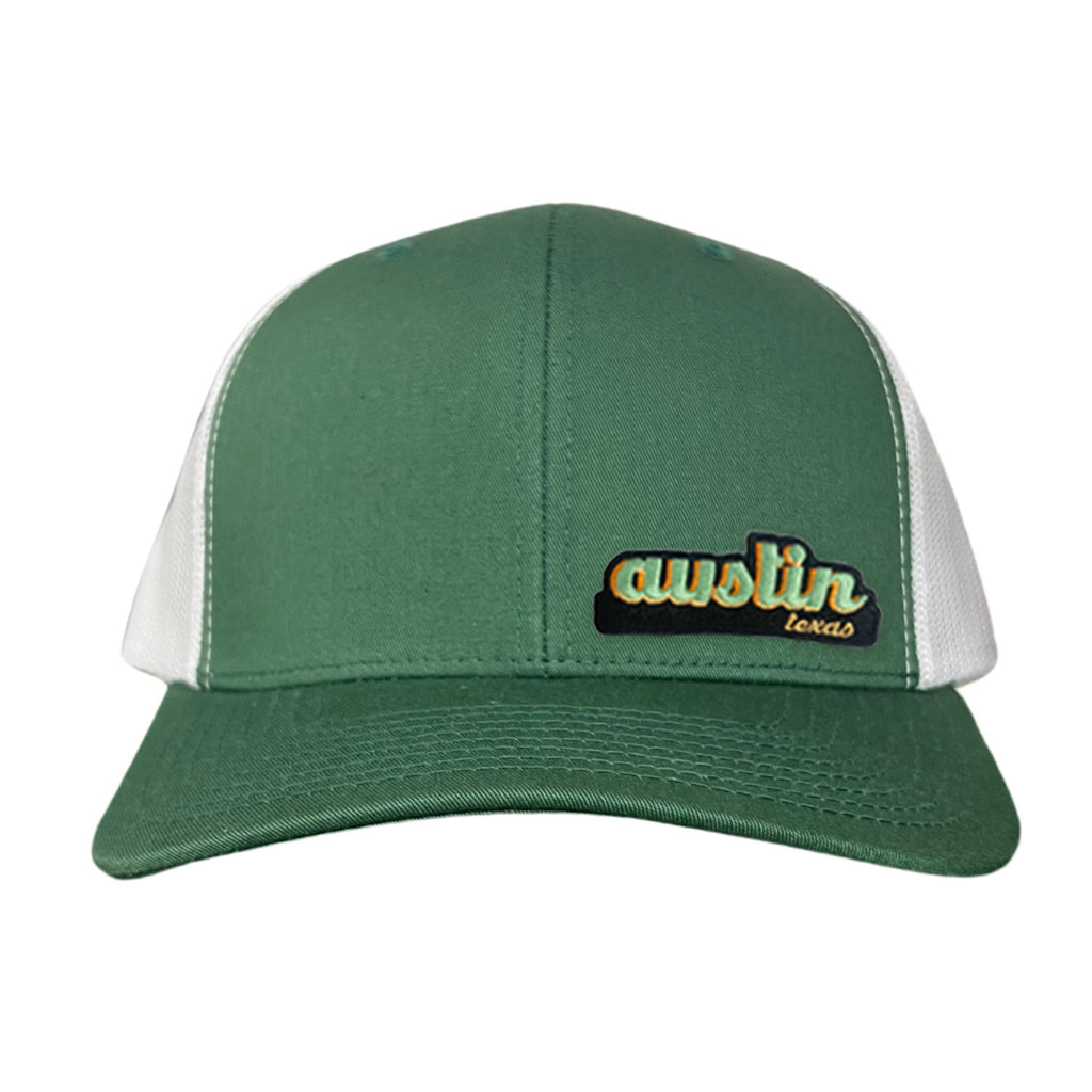 Vintage-style trucker hat with green, blue, and white details and an Austin Texas cut-out patch