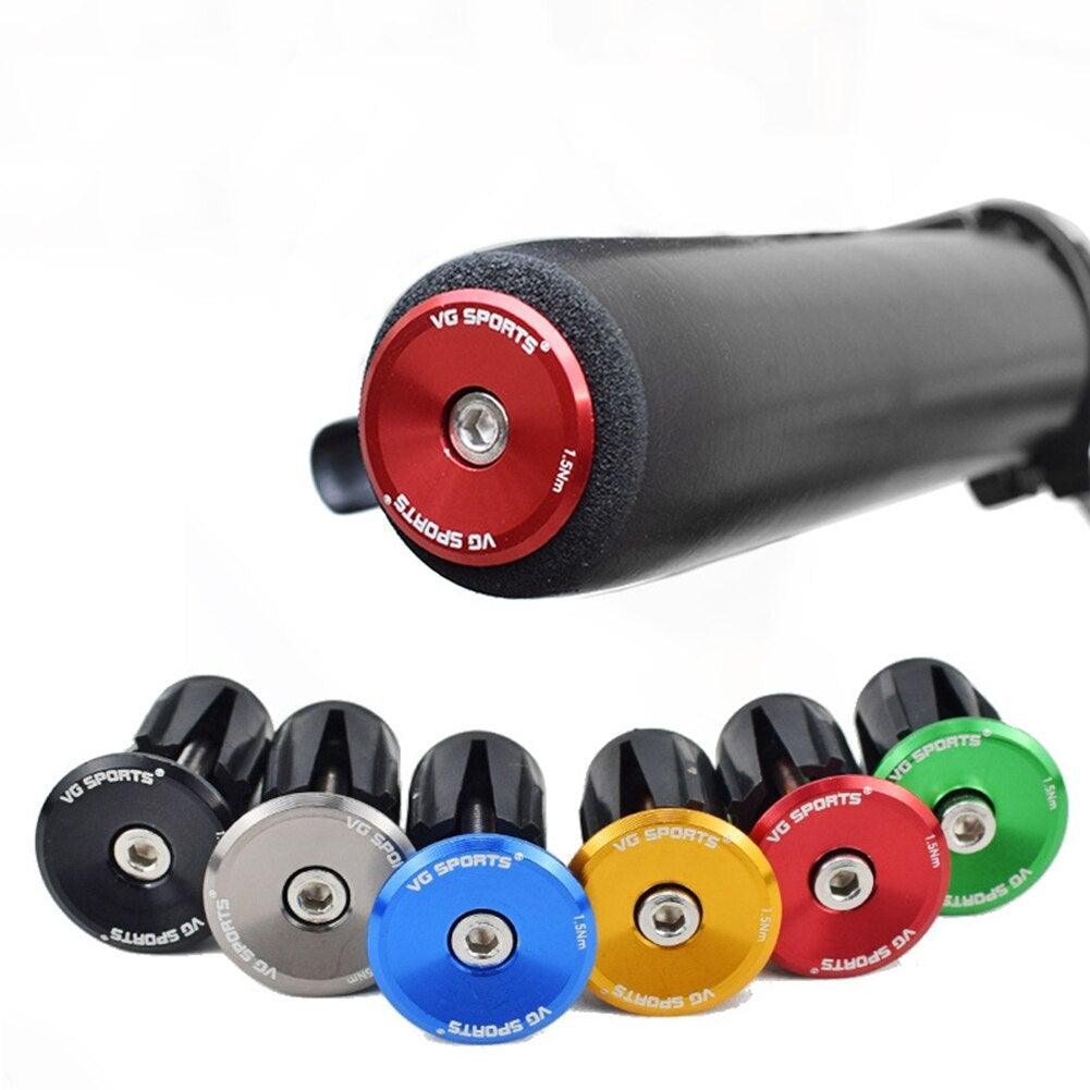 Set of lightweight aluminum bike handlebar end plugs in metallic finish