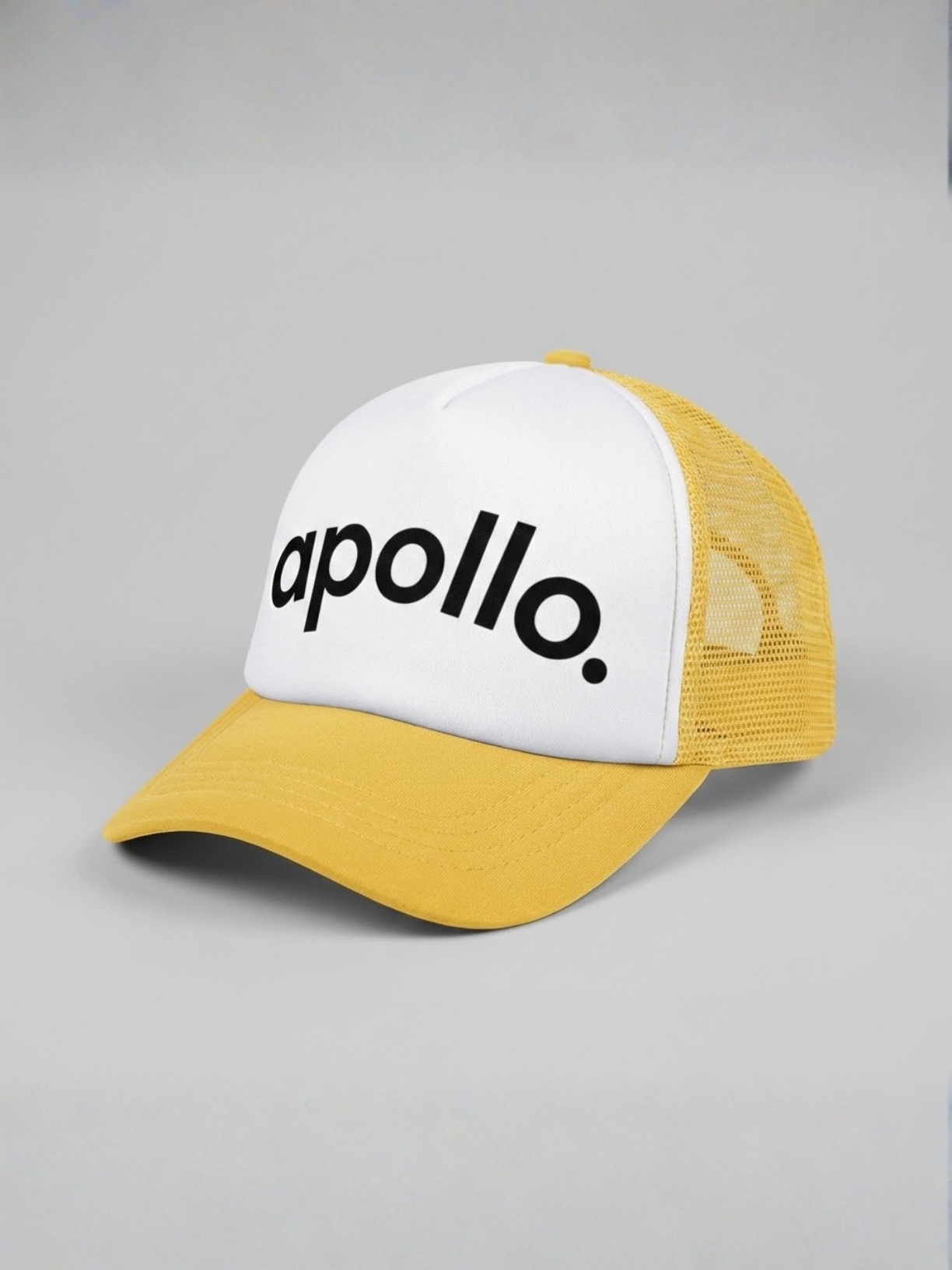 Yellow and white colorblock trucker hat with mesh backing and adjustable snap