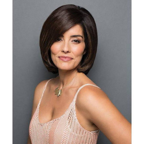A close-up of a 100% human hair bang top piece with a natural-looking monofilament base.
