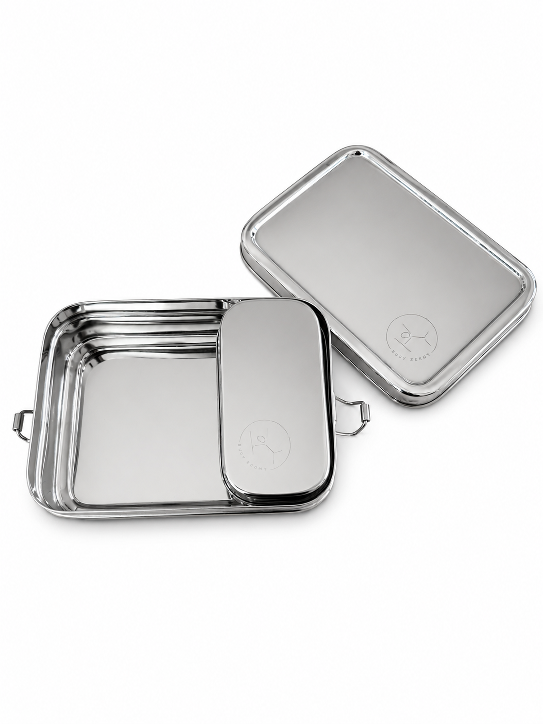 A minimalist silver stainless steel lunch box with an included small inner snack container.