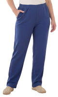 Woman wearing comfortable flat-front knit pants with straight leg silhouette in solid color