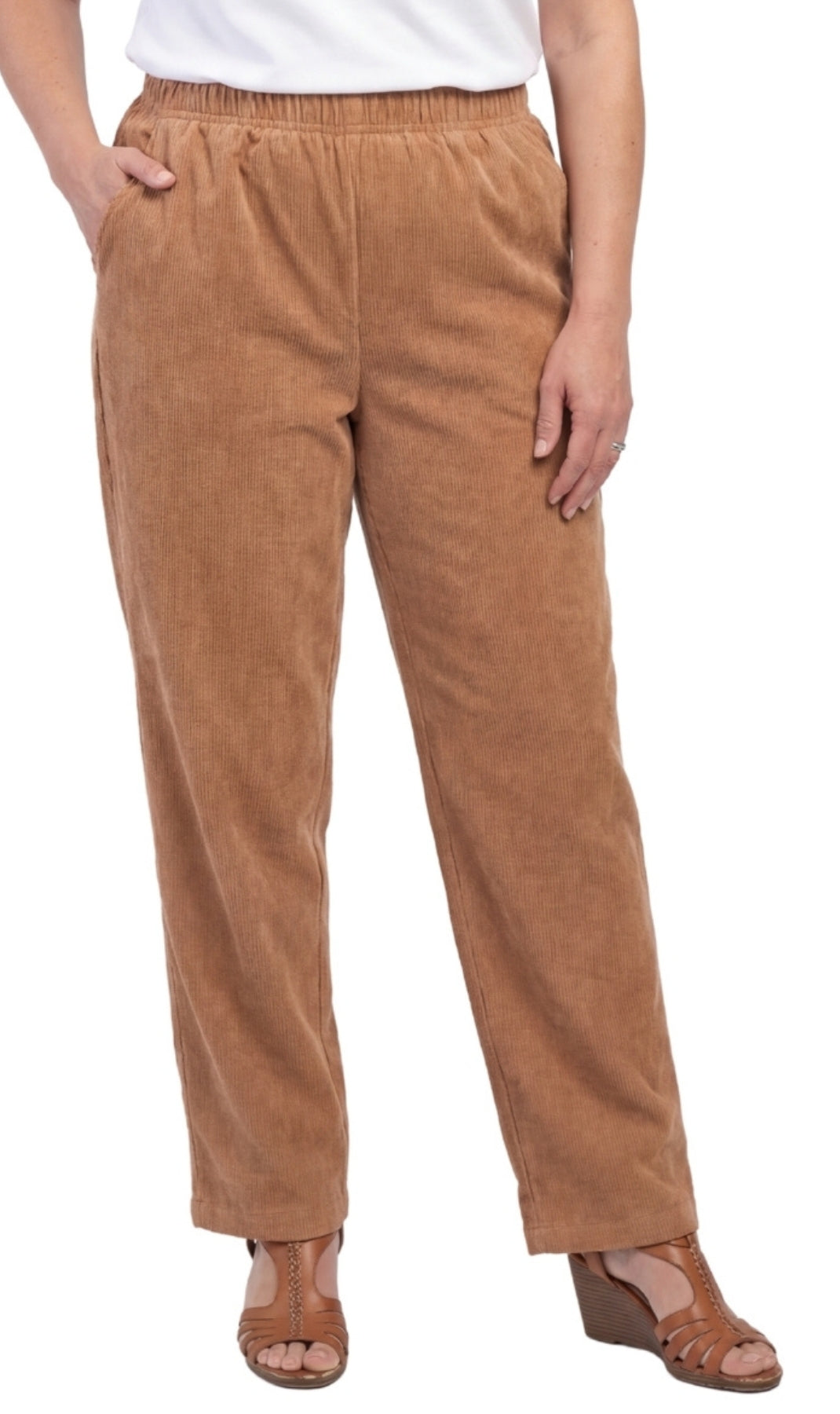 Close-up of fine wale corduroy fabric on women's pull-on pants with elastic waistband