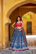Blue Vaishali silk lehenga choli featuring printed designs and Gota Patti lace work.