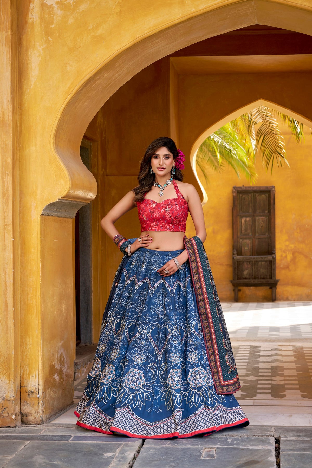 Blue Vaishali silk lehenga choli featuring printed designs and Gota Patti lace work.