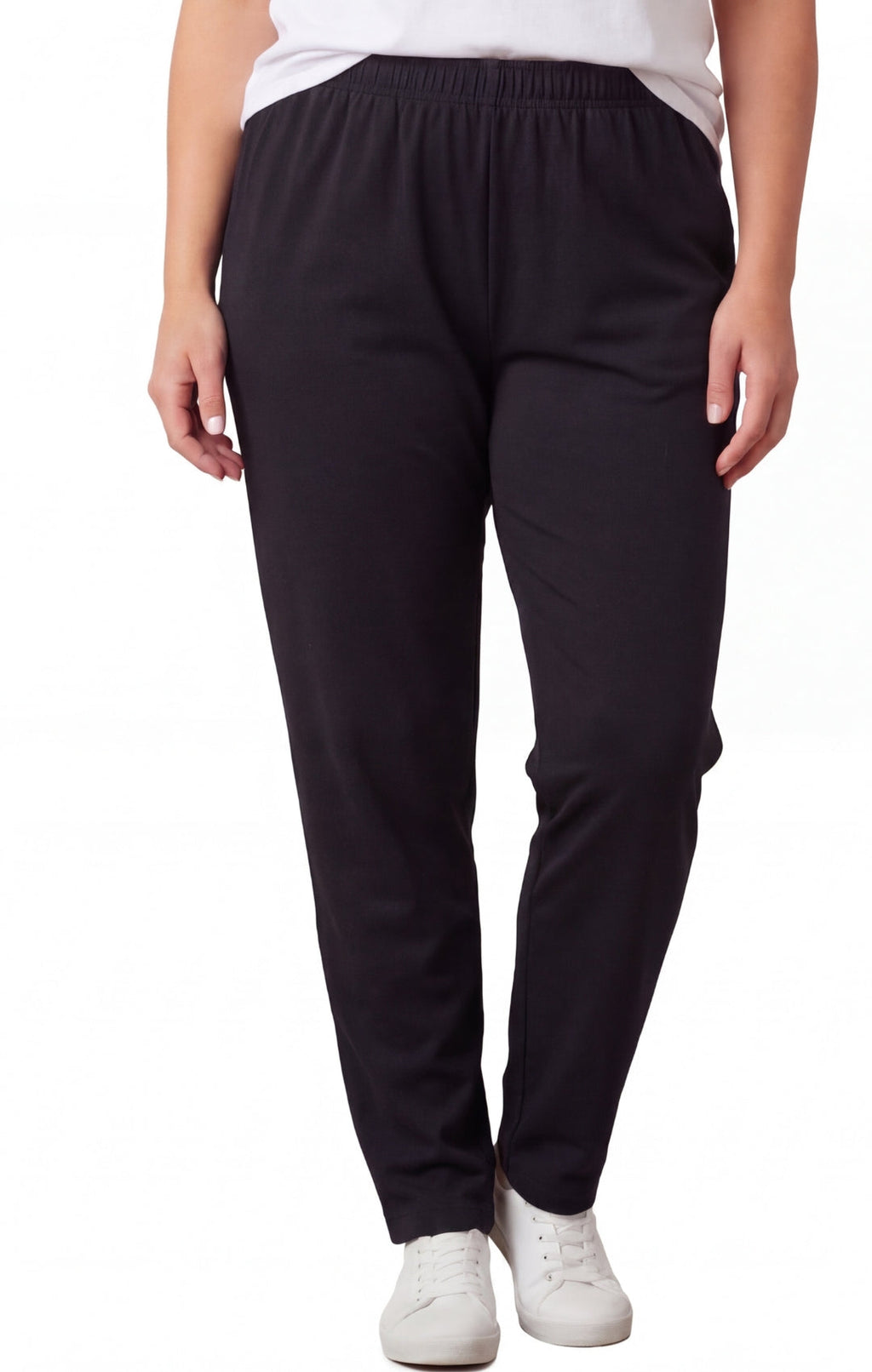 Woman wearing black high-waisted premium cotton stretch leggings with a flattering high-rise waistband