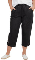 Woman wearing relaxed-fit lightweight denim capri pants with decorative studs at the hem