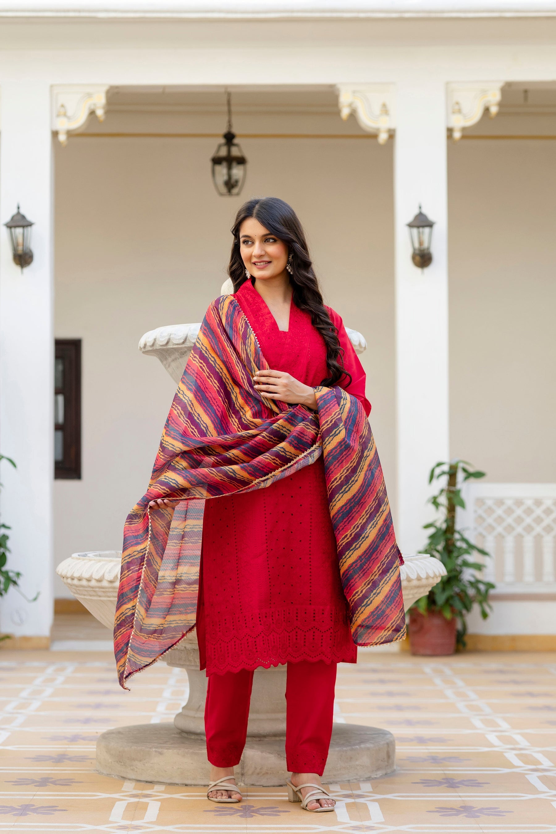 Elegant red Roman Silk kurta pant set with detailed Chikan Kari embroidery and matching dupatta