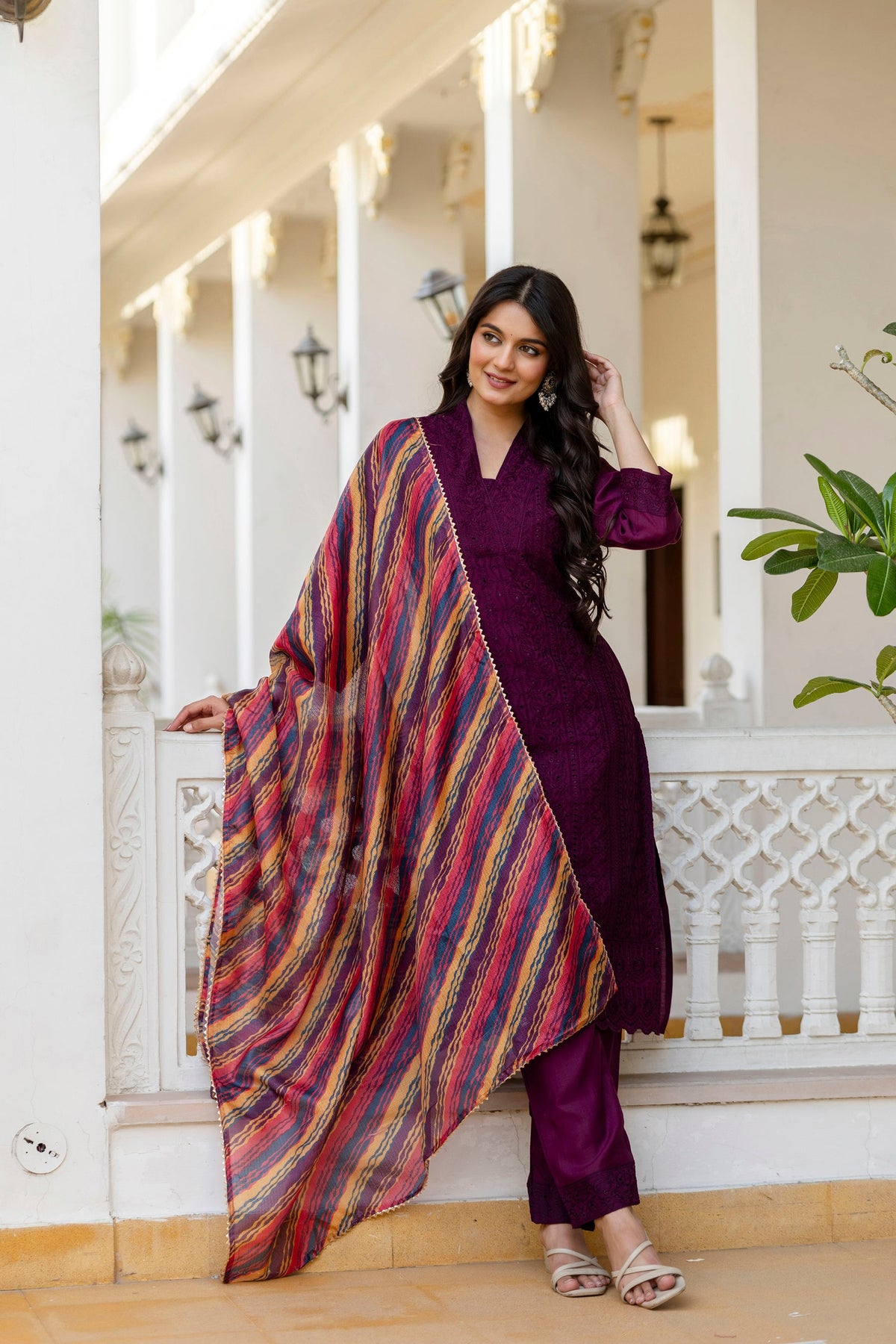 Wine Roman Silk kurta set featuring detailed Chikan Kari embroidery with matching pants and dupatta.