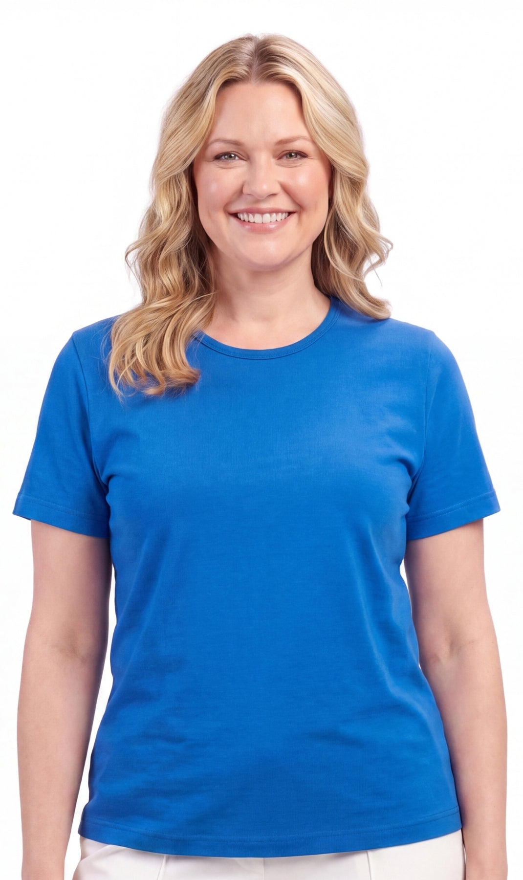 A woman wearing a minimalist relaxed fit crew neck cotton blend t-shirt in solid color