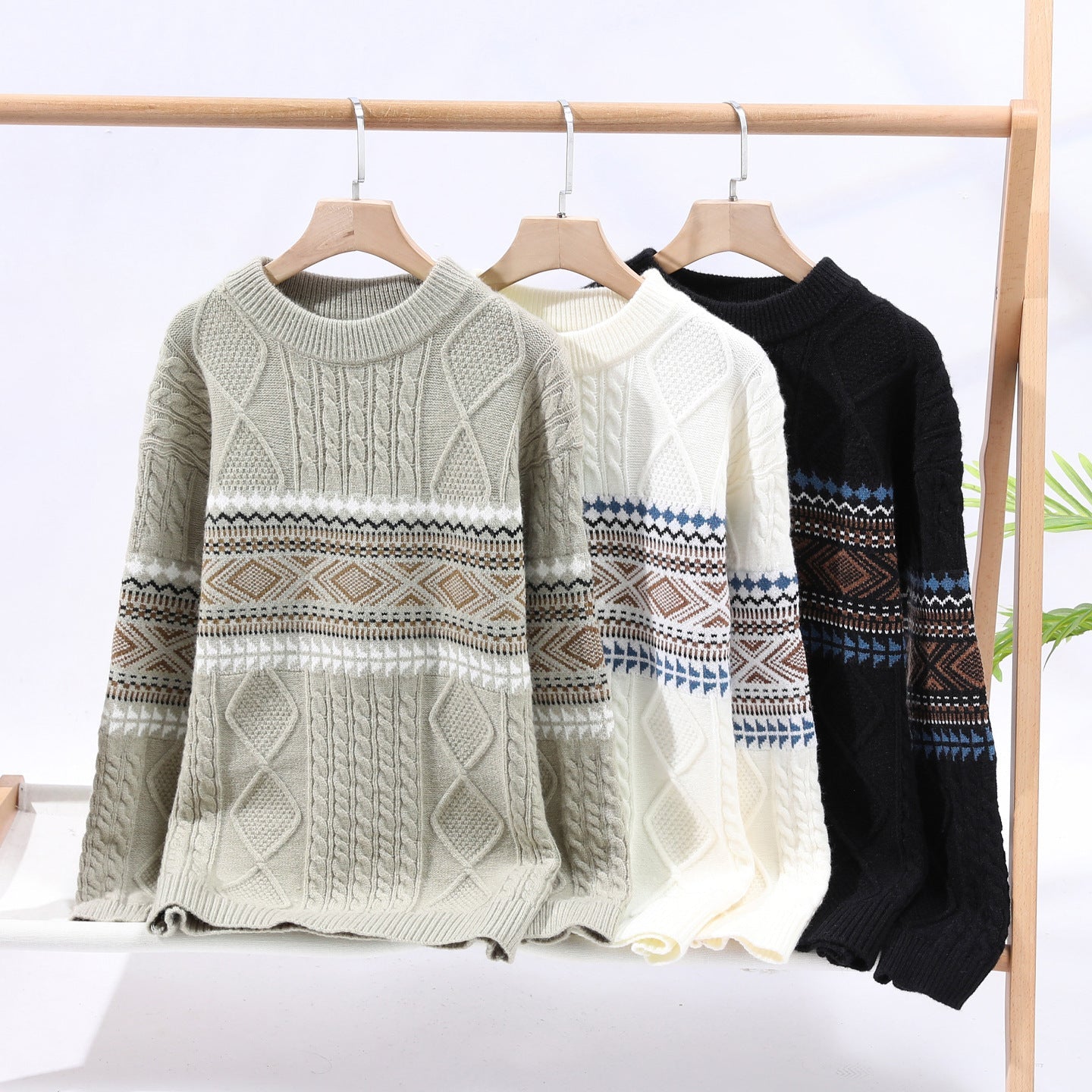 Men's classic mock neck sweater with geometric pattern in black, brown, and blue knit fabric