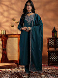 Woman wearing a Rama Mustard Vichitra Silk Salwar Suit with gold embroidery and gota patti work