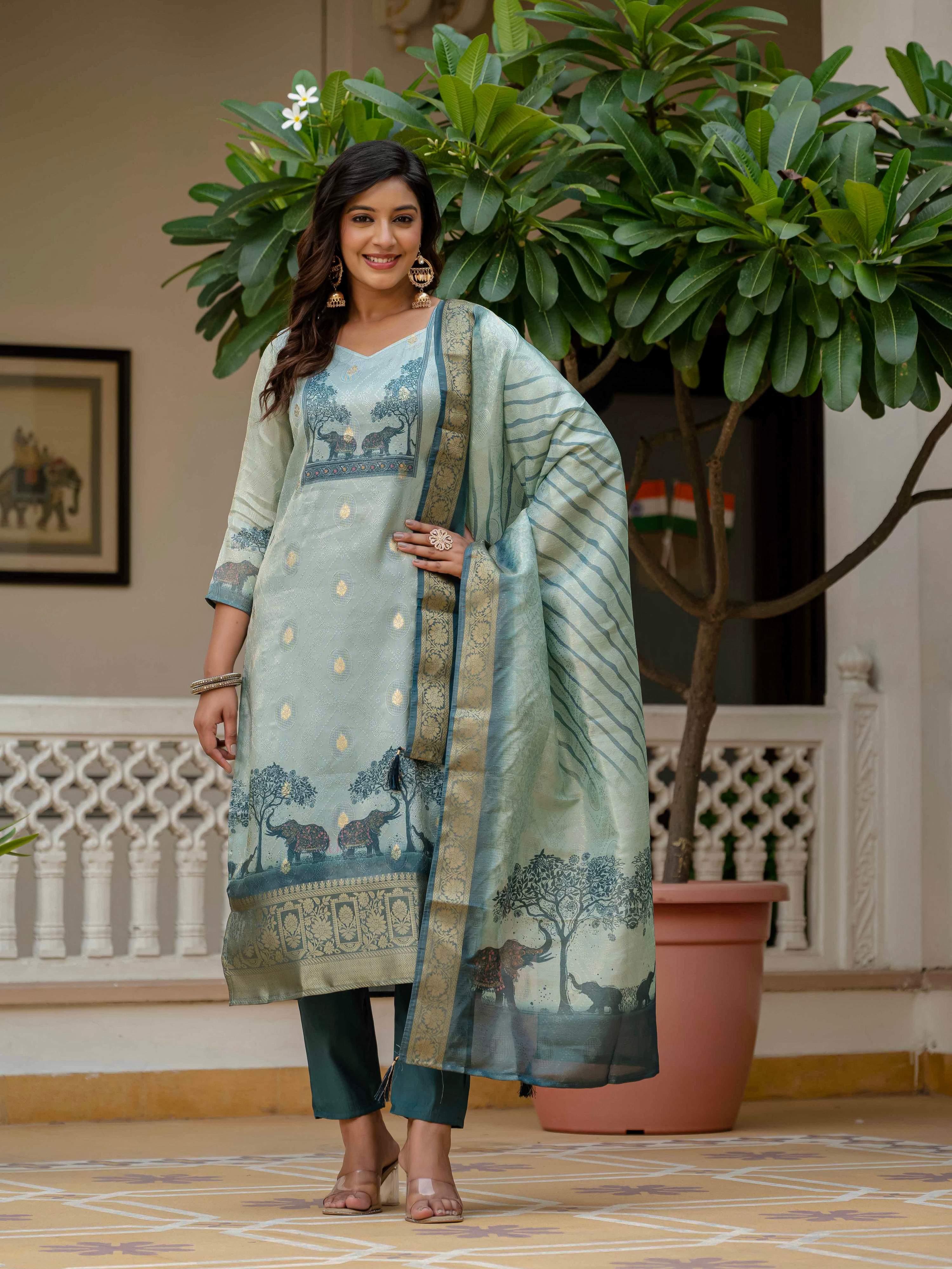 Pista Green Jacquard Silk Salwar Suit with intricate embroidery and gota patti work
