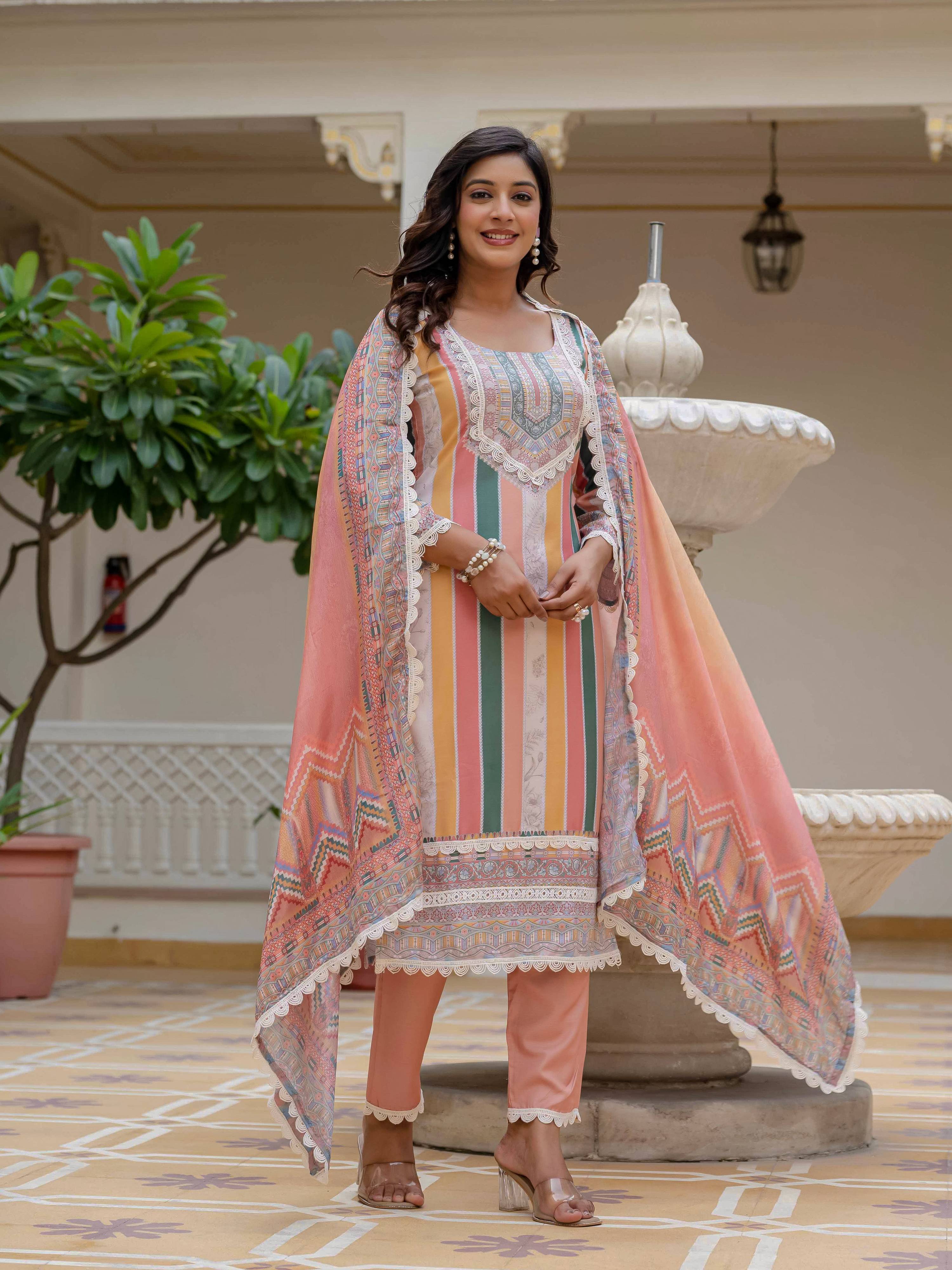 Vibrant orange rayon salwar suit with festive embroidery and gota patti detailing