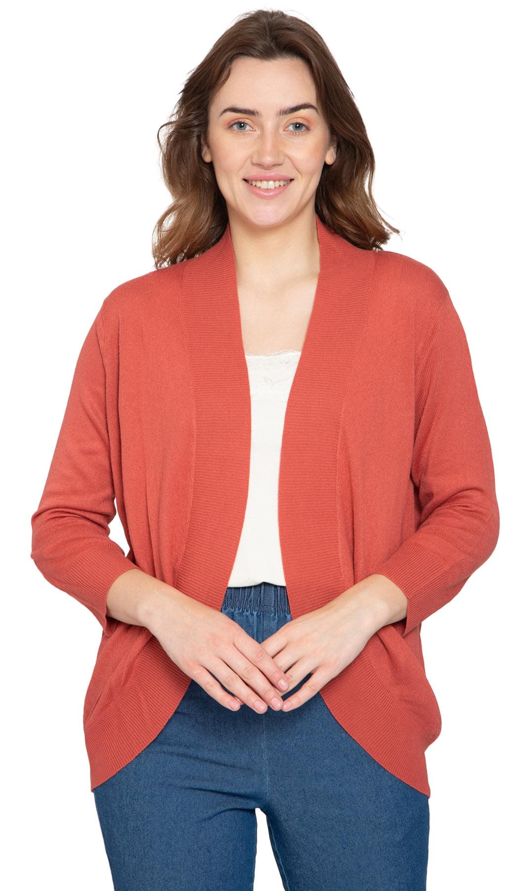 Women's open front knit cardigan with a curved hem in rust, navy, or beige