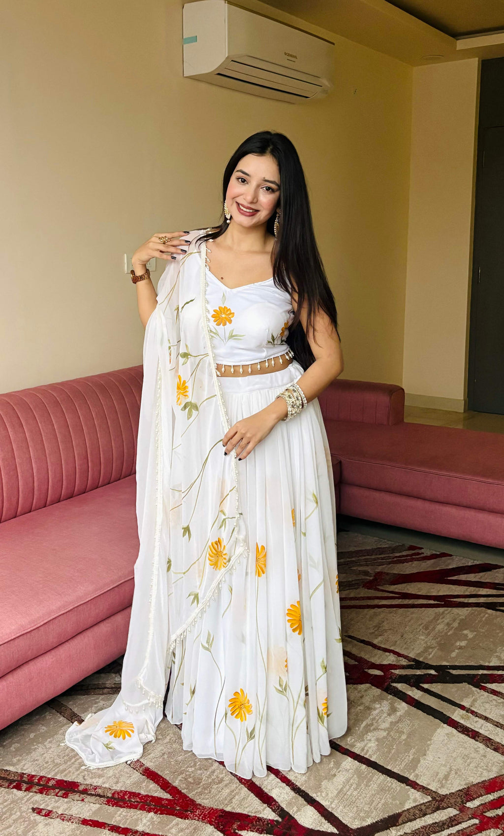 White organza lehenga choli set with hand-painted floral design