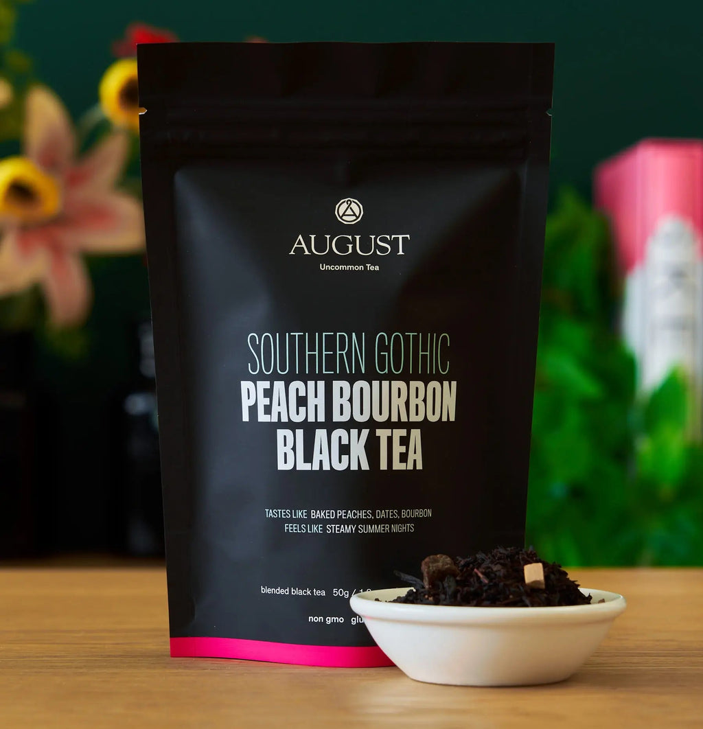 Southern Gothic peach bourbon black tea packaging featuring loose leaf tea in a bowl.