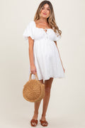 White textured maternity mini dress with trendy bubble sleeves