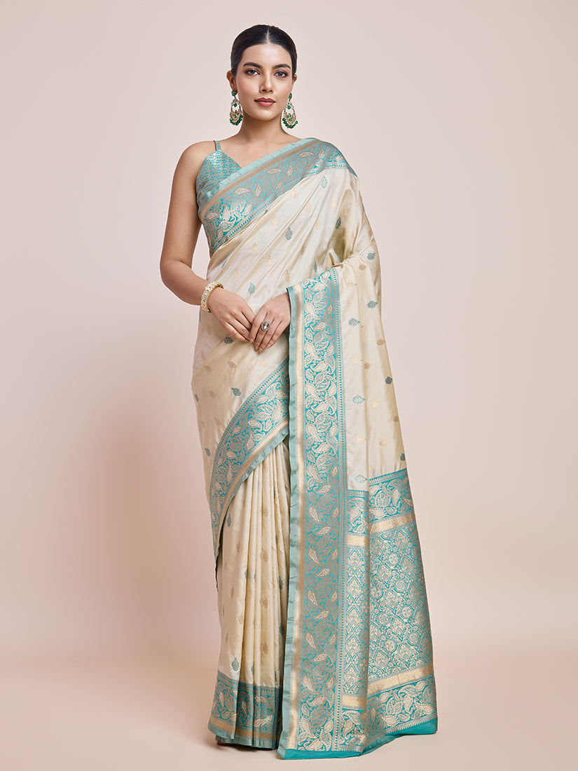 Cream-colored Banarasi satin silk saree with elegant zari woven accents