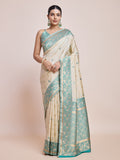 Cream-colored Banarasi satin silk saree with elegant zari woven accents