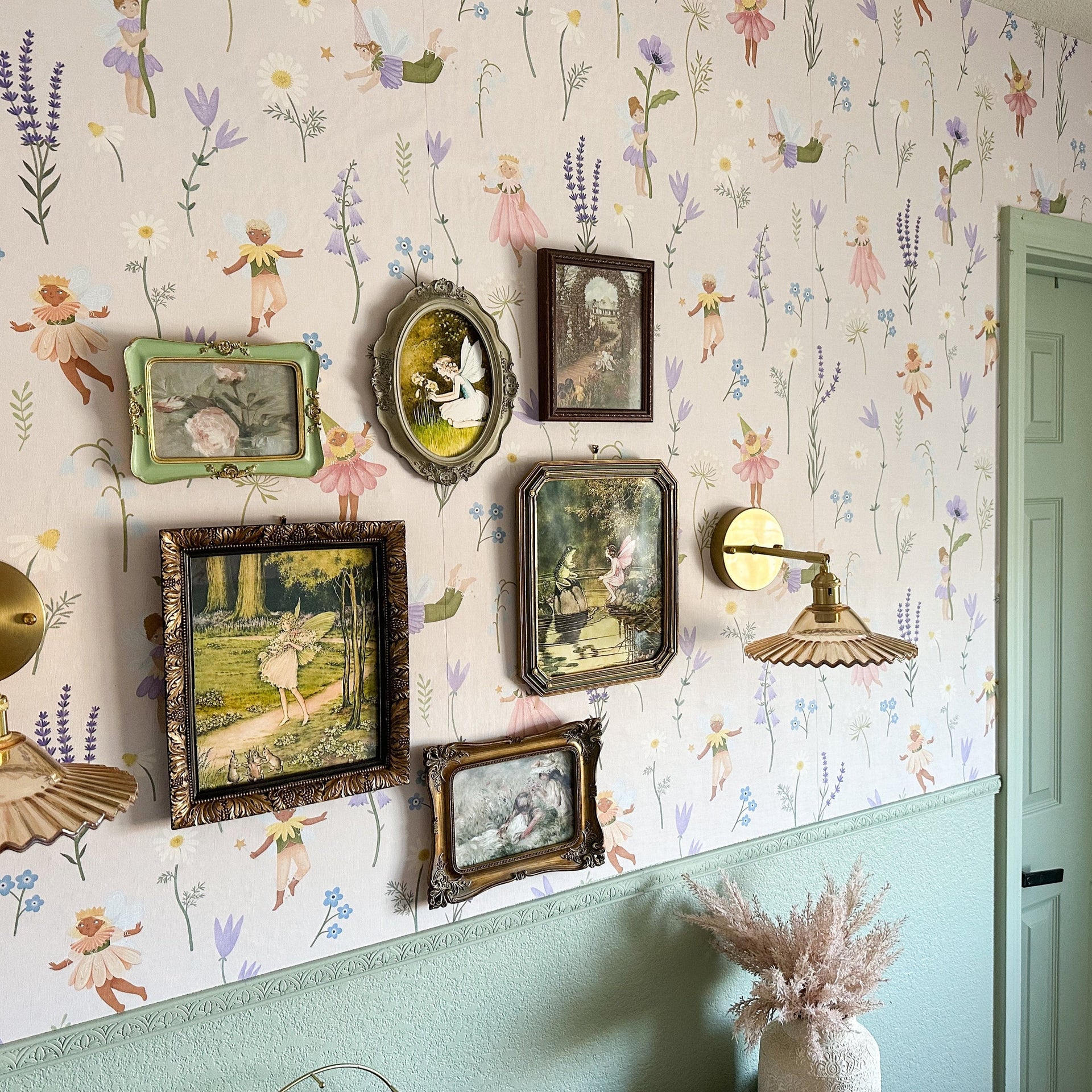 Iridessa floral pattern wallpaper in pink, lavender, and green for a whimsical room.