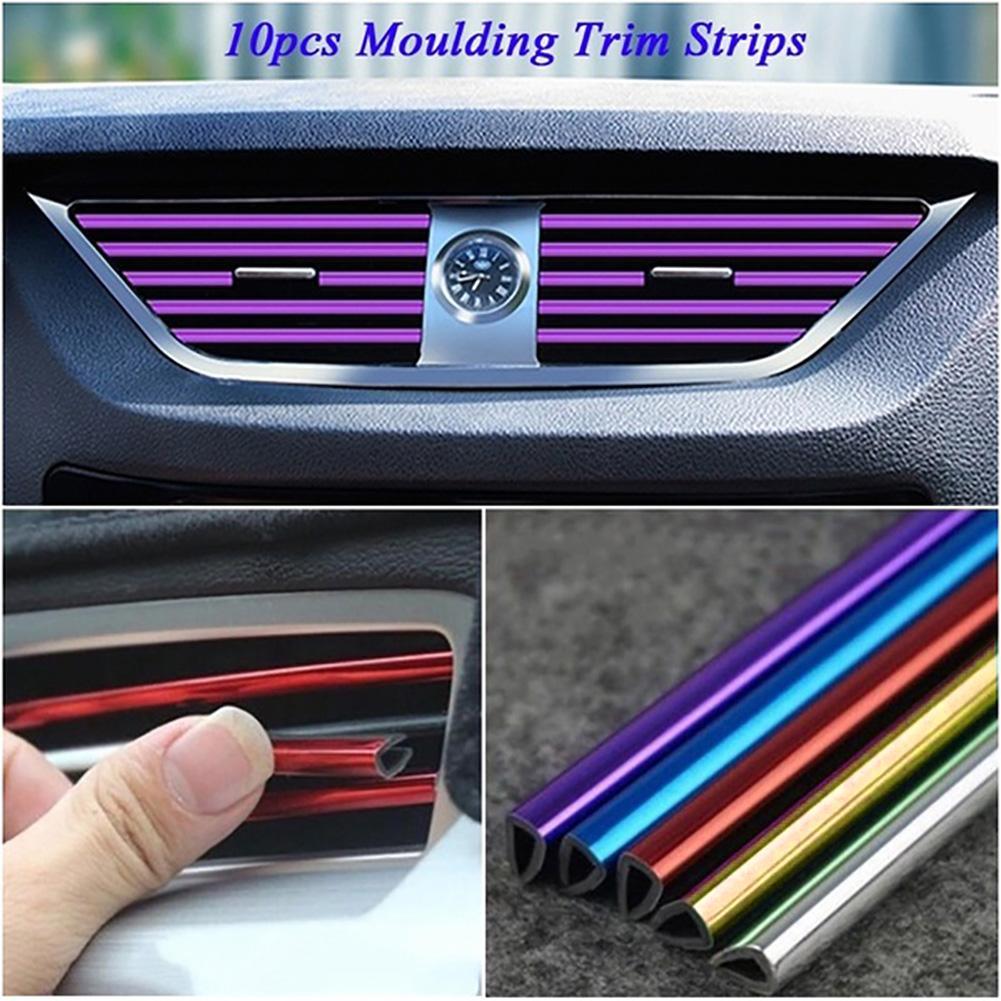 A set of silver and blue U-shape car air vent decorative molding trim strips