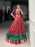 Red Tasar Silk Leheriya print lehenga choli with intricate Zari weaving work.