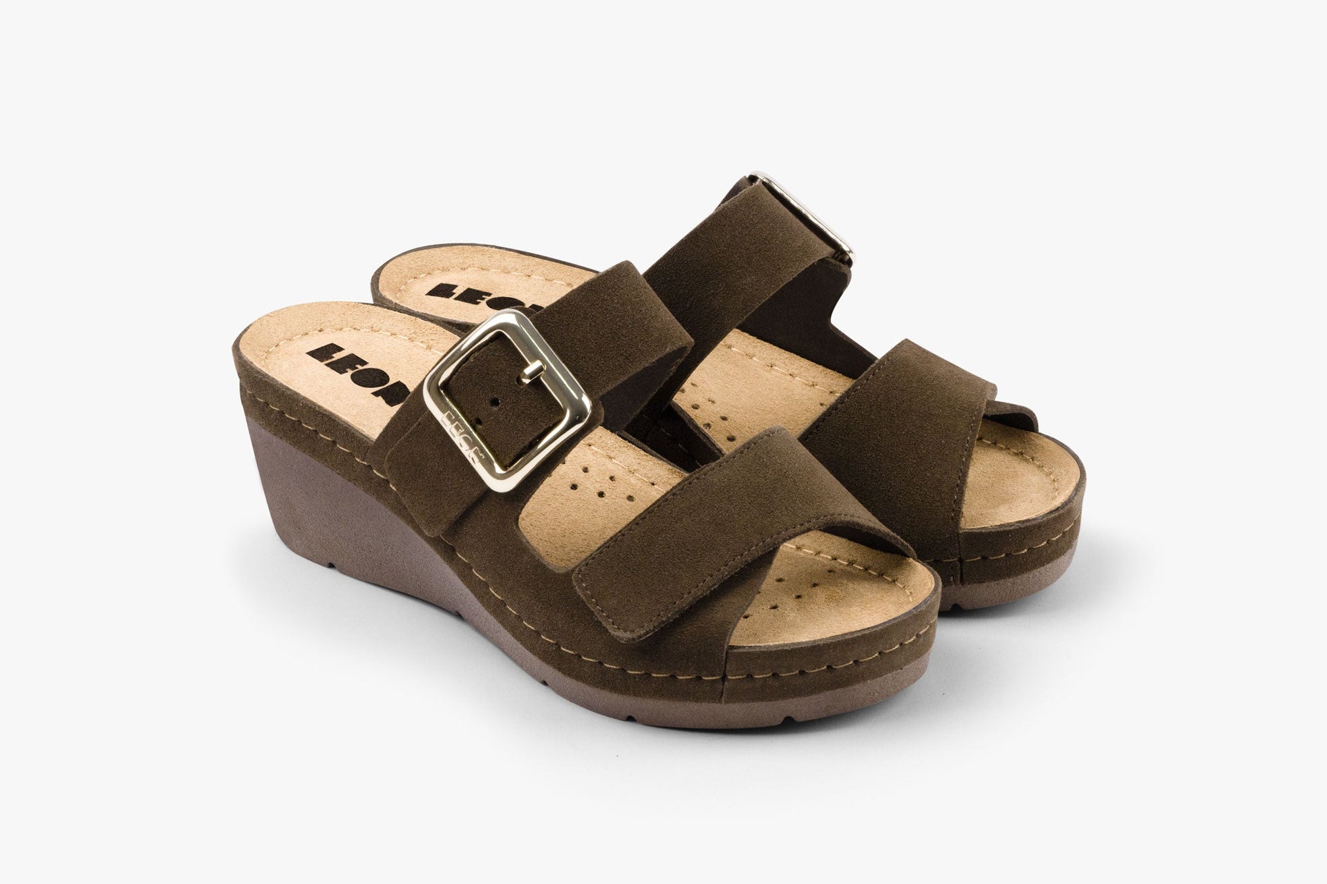 A pair of women's olive green leather wedge sandals with an adjustable metal buckle and anatomical footbed.