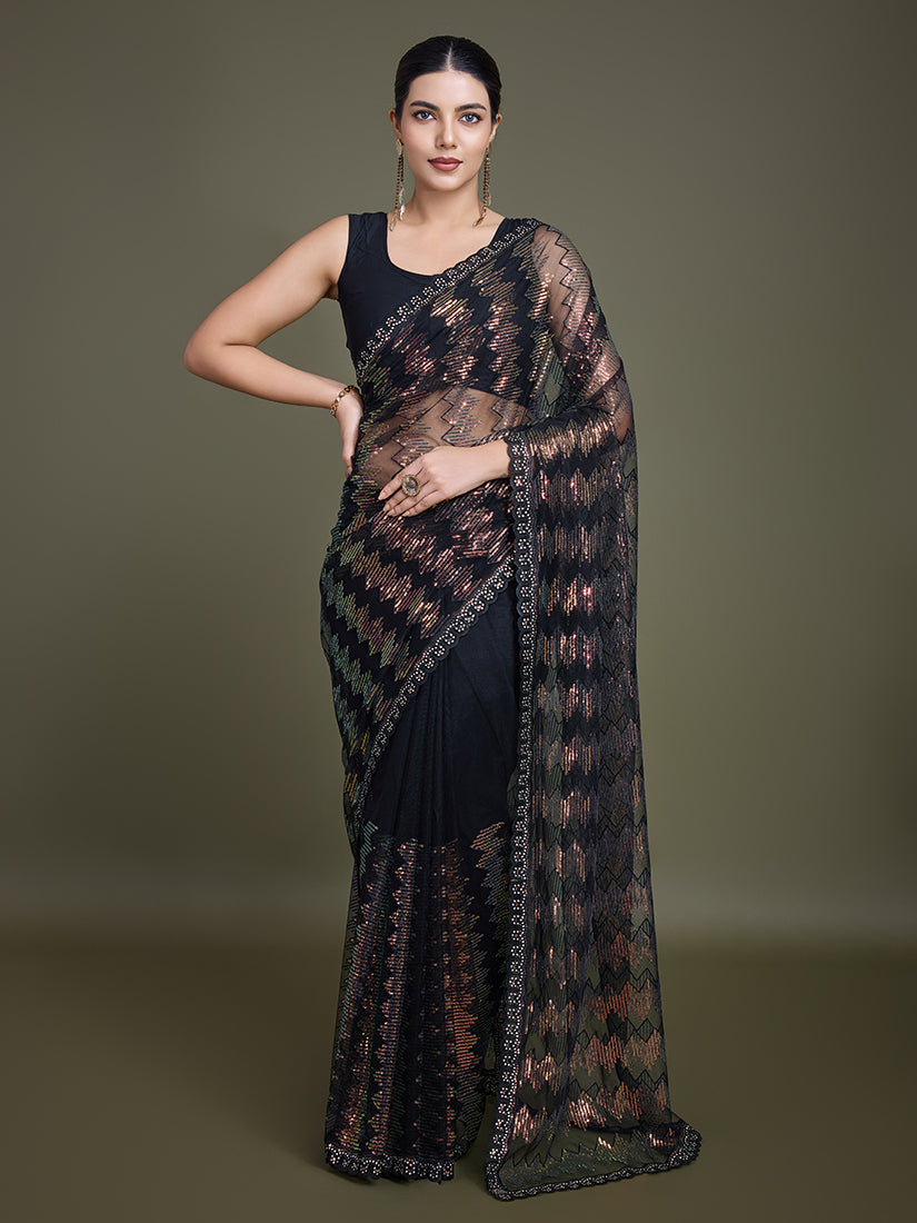Black net designer saree featuring all-over sequin embellishments.