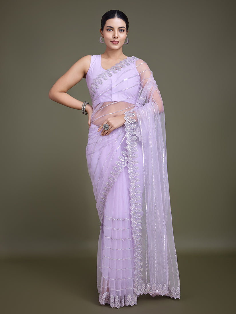 Lavender soft net saree adorned with sparkling sequin work