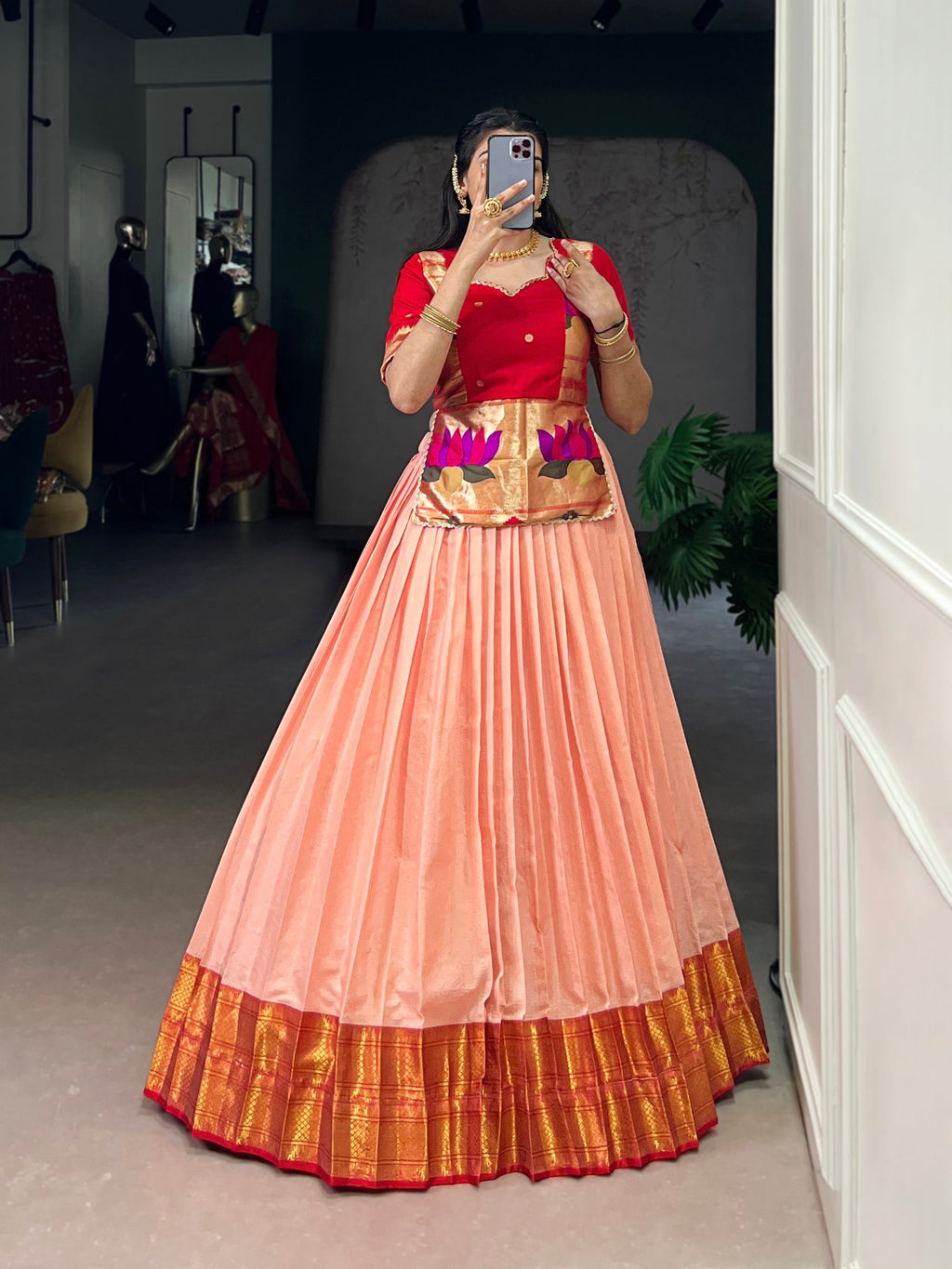 Peach cotton silk lehenga choli with ornate Zari weaving detail