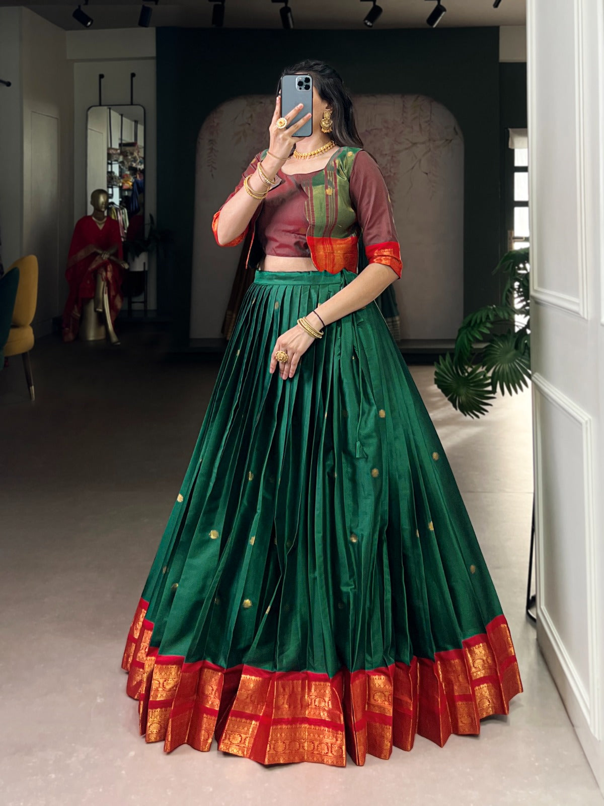 Green Poly Cotton lehenga choli with traditional Zari weaving work and a matching Koti jacket
