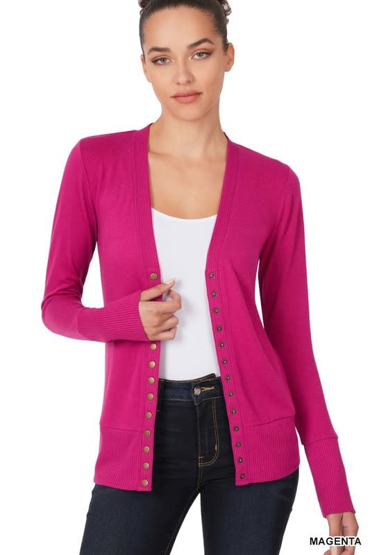 A vibrant magenta full-sleeve cardigan with snap-button front closure