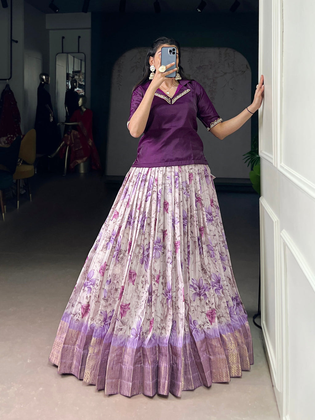 Elegant purple Dola Chex lehenga choli with floral prints and intricate gold Zari weaving detail