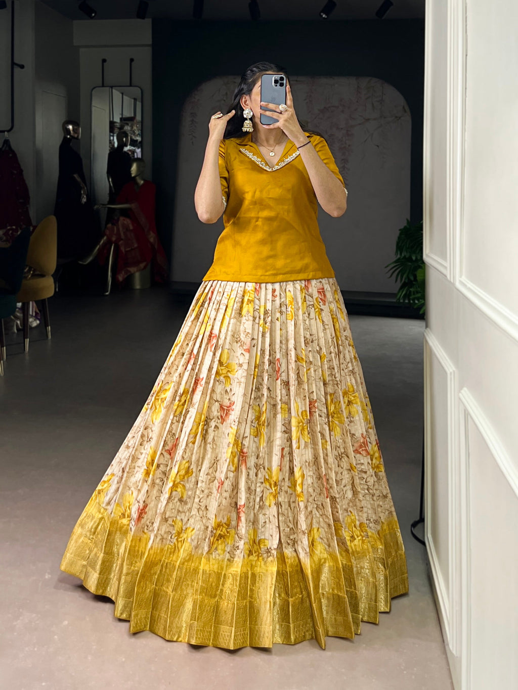 Bright yellow Dola Chex lehenga choli with floral prints and intricate Zari woven detailing