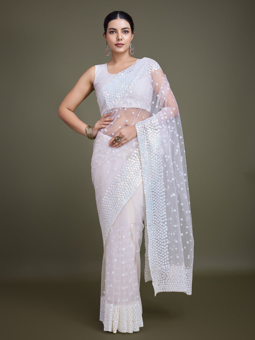 Stunning white soft net saree with heavy sequin embellishments on the border and pallu