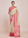 Cream Banarasi tissue silk saree with gold zari woven pattern