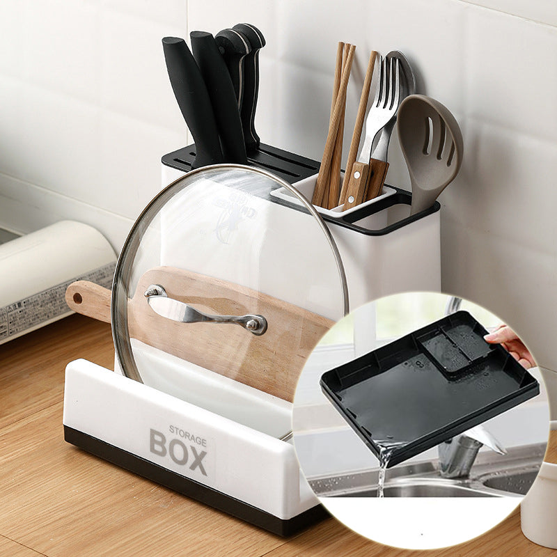 Modern white kitchen knife and tableware storage rack on a minimalist countertop