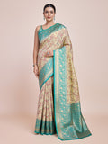 Cream tissue silk saree featuring intricate Zari weaving