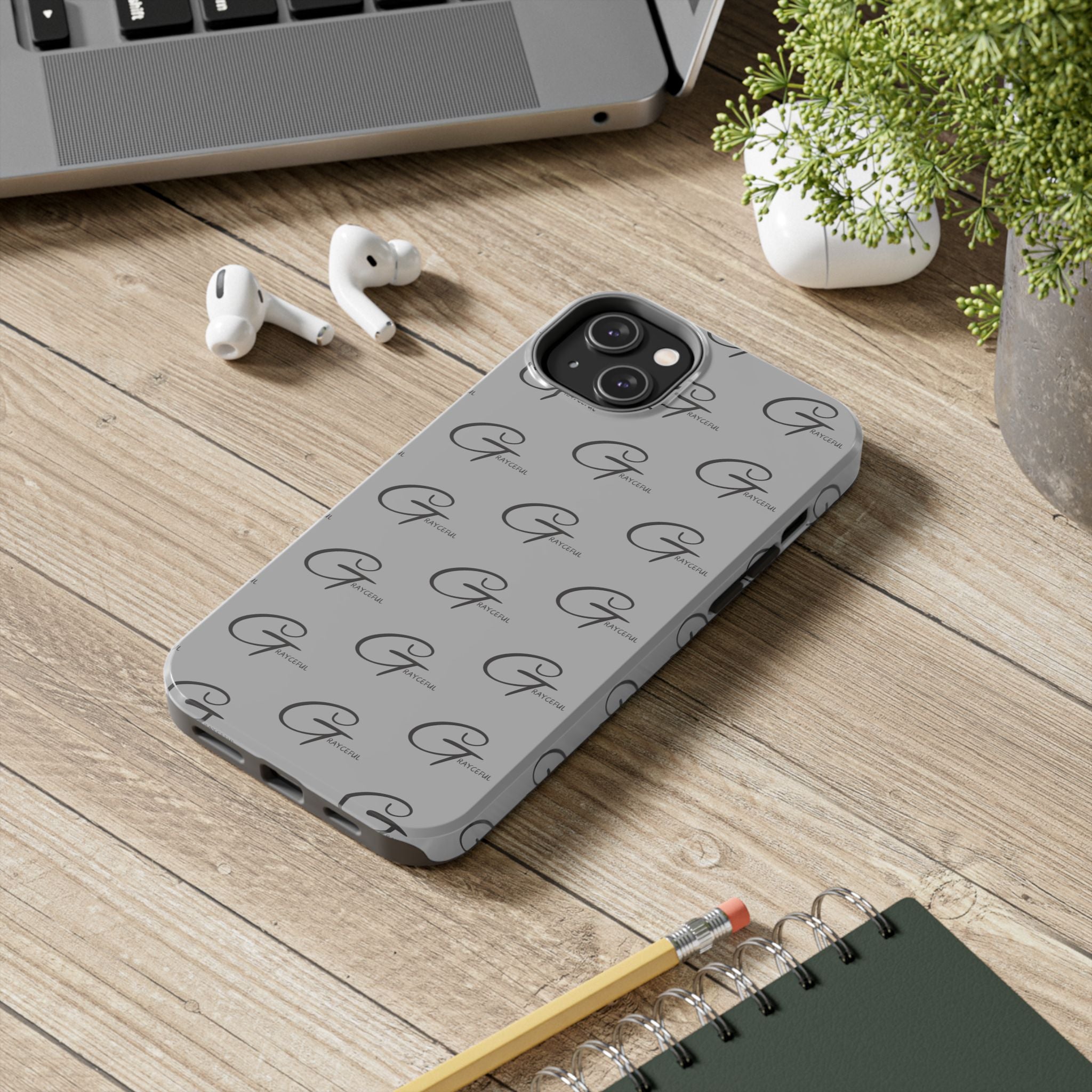 Minimalist grey and black tough phone case with a durable Polycarbonate shell and protective interior lining.