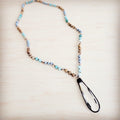 Long beaded necklace featuring Amazonite and Picture Jasper beads with a clear crystal teardrop pendant