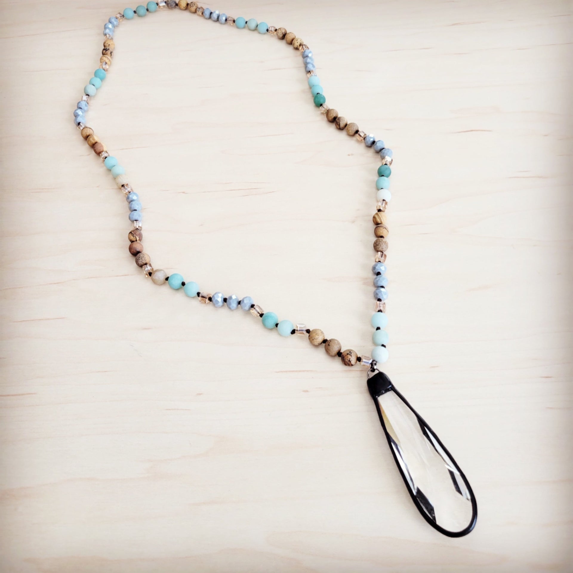 Long beaded necklace featuring Amazonite and Picture Jasper beads with a clear crystal teardrop pendant